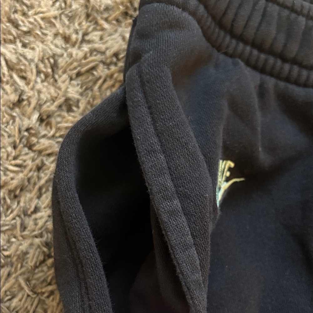 Nike Black Sweatpants with White and Green Logos - Picture 6 of 9